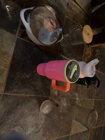 Water bottles, sauce pan, glass cup, flower vases. Free 1