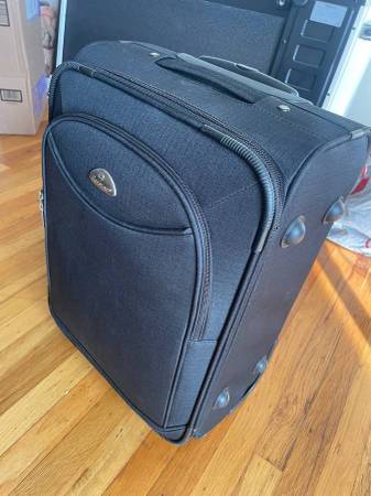 Suitcase and small electrical home heater 1