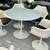 Vintage 1974 Eero Saarinen rd table & 4 swivel chairs 1 thumbnail
