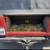 Adventure-Ready 1997 Jeep Wrangler Sport in Vibrant Red 12 thumbnail