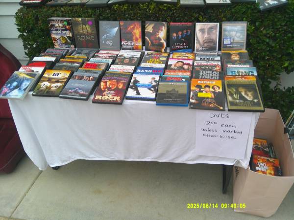 About 90 DVDs 1