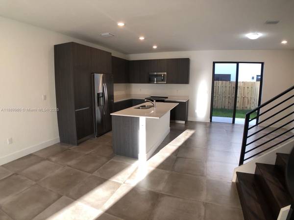 Spacious 2-story condo featuring 3 bedrooms and 2.5 bathrooms. 1