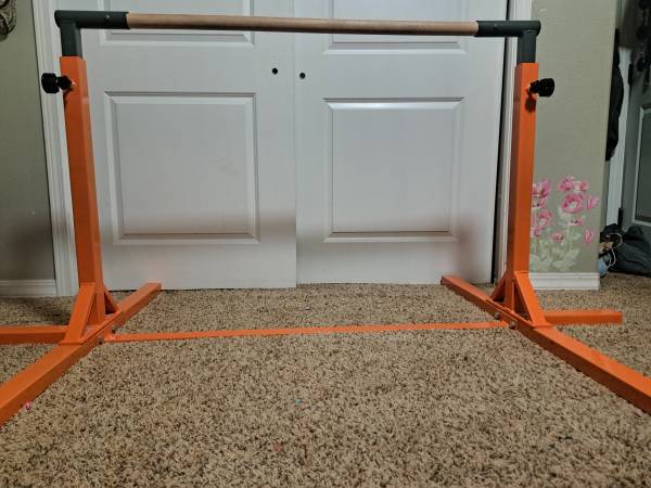 Adjustable gymnastics bar 1
