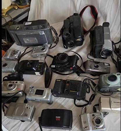 Collection of various cameras and camcorders 1