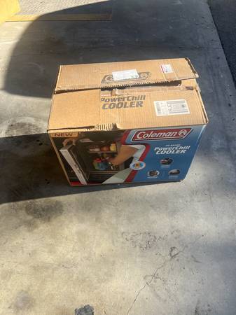 coleman mini 12volt cooler in original box used once--excellant condit 1