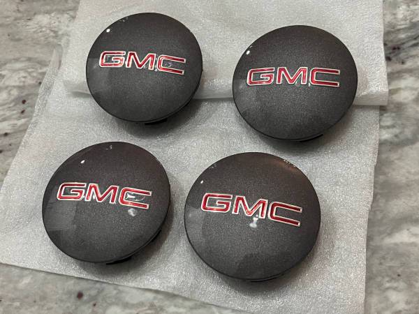 Four Dark Grey 2004-2016 GMC Acadia / Envoy Center Caps 1