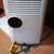 Like new De Long High Penguino 12000 BTU portable AC unit in home 4 thumbnail
