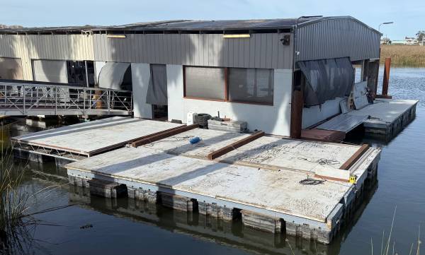 Boat Docking. floating wide barges. And liveaboard 1