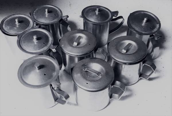 SEVERAL SS SYRUP PITCHERS 1