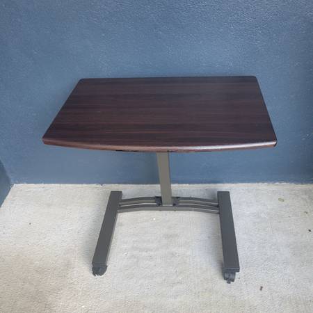 Small compact rolling adjustable height table 1