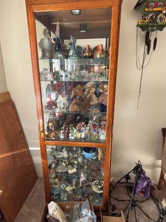 Collectors Cabinet By Howard Miller 1