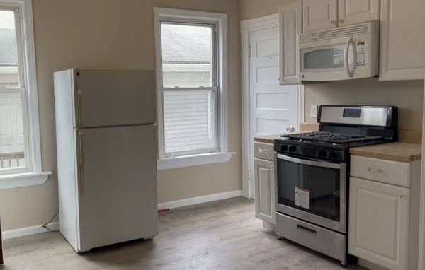 Renovated 3 bedroom unit with parking and private porch 1