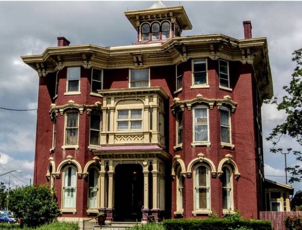 Executive Multi-Room Suite inside a historic landmark. 1