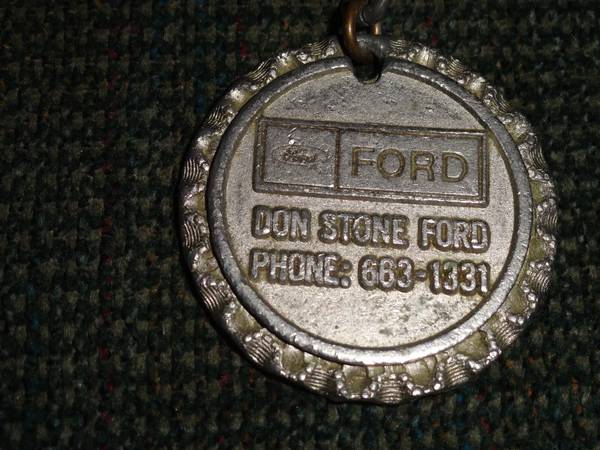VINTAGE DON STONE FORD SILVER DOLLAR KEYCHAIN 1