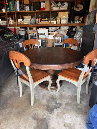 Solid wood round table with 6 chairs. 1
