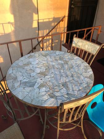 Stone patio table and 3 matching chairs and pads - $150 (Albany)63437106771073123