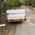 Get the job done with a utility trailer featuring sturdy 🌿 wooden side rails. 1 thumbnail