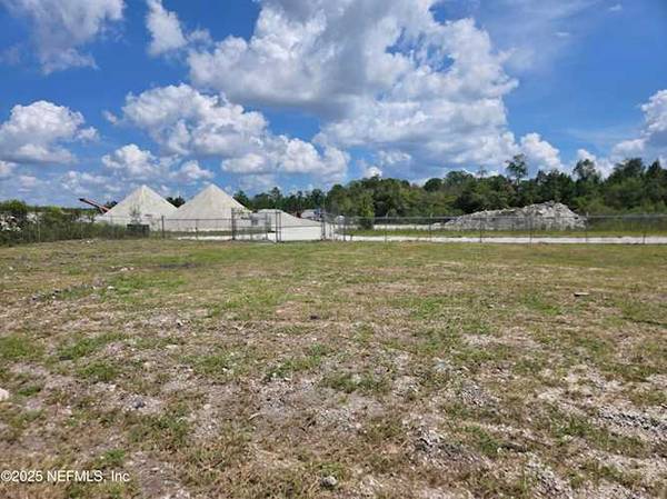 This 1-acre industrial lot in centrally-located 1