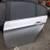 BMW E90 driver rear door; Silver w/ dark 3.0 tint, very good condition 1 thumbnail