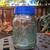 Embossed Medallion Glass Jar 28oz with Blue Lid, Half Green 1 thumbnail