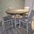 Ashley Wooden Counter Height Dining Table 4 Cushioned Chairs 4 thumbnail