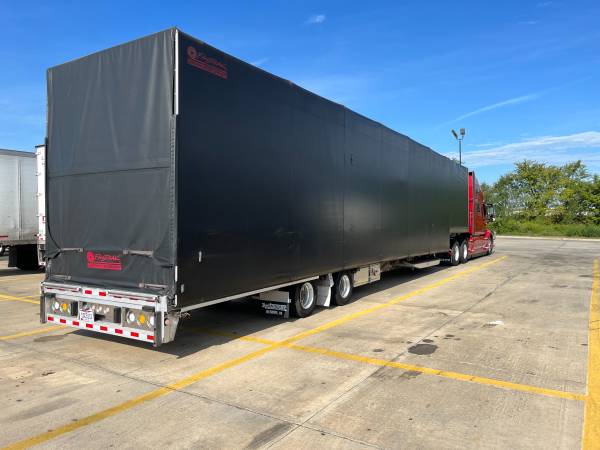 Step deck Conestoga Driver 1