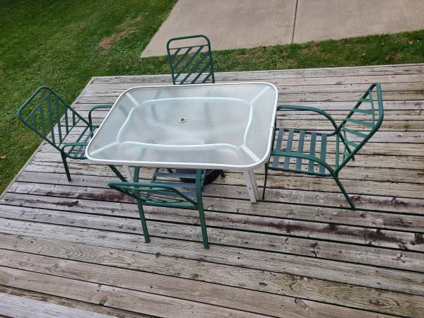 Outdoor glass table with 4 chairs 1