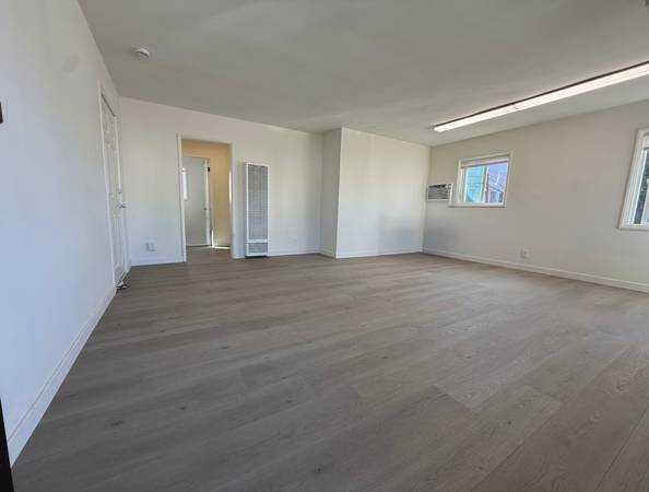 Location, Location.. New flooring, paint and baseboard 1