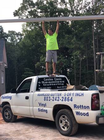 Seamless Gutters / Replacement Windows 1