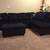 Black microfiber sectional couch and ottoman 1 thumbnail