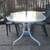 WHITE OUTDOOR GLASS TABLE WITH UMBRELLA 3 thumbnail