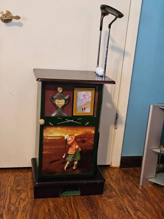 Golf putter and storage and practice unit 1