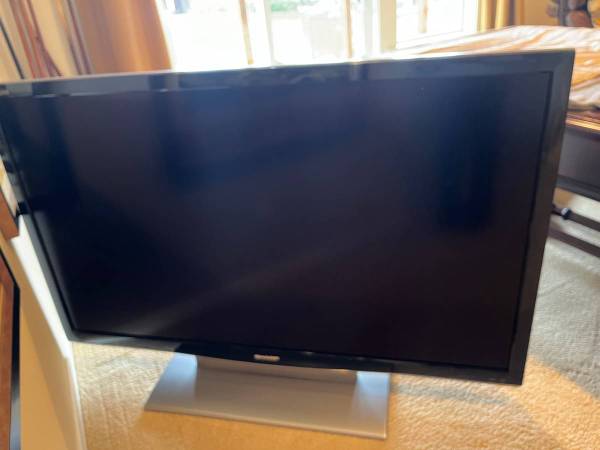 Sharp 65" flat screen TV 1