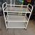 Used white rack shelf metal wheels 1 thumbnail