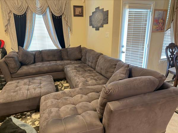 Charcoal gray sectional sofa with ottoman 1