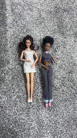 Two Barbies With Flexible Arms 1