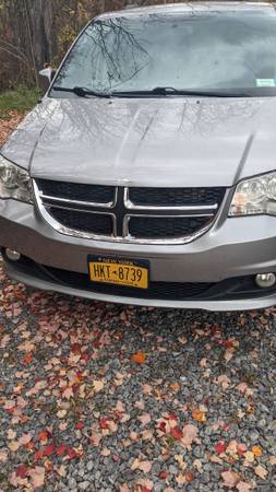 2011-2018 hood for Dodge Caravan wanted must be in really good shape and grey 1