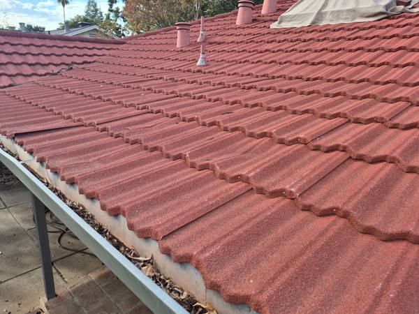 2181 square feet of metal Calpac type roofing.  $.50/sq ft 1