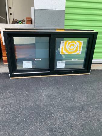 42 1/2”x 23”Marvin black Tempered sliding window 1