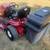White outdoor zero turn riding lawn mower with bagger. 2 thumbnail