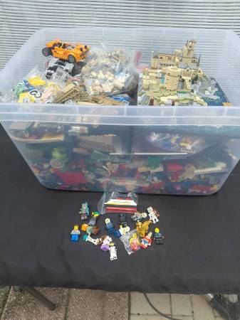 Legos Plastic bin of Authentic Legos from various sets including many 1