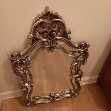 Mid-century Rocco style gold wall mirror. Scrolls plumes Hollywood reg 1