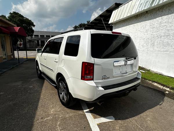 2015 HONDA PILOT TOURING TÍTULO LIMPIO SIN ACCIDENTES - $10,500 (Houston)63617101894787122
