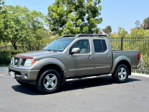 Nissan Frontier 4x4 - $7,999 (Chula Vista)63624789344129123