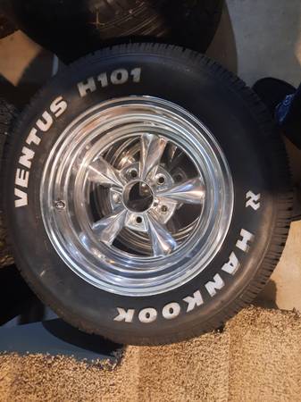 4 crome mag rims with tires 1