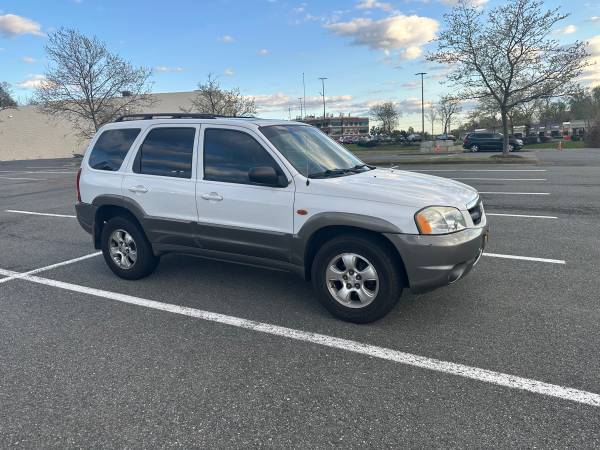 2003 MAZDA TRIBUTE 3.0L Auto ES 4WD igual que FORD ESCAPE bajo 132 mil mi - $4,321 (NoVA)63618664971393121