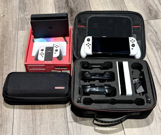 Nintendo Switch OLED Bundle - 2 Pro Controllers, 2 Docks & more 1