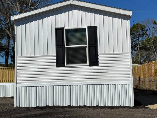 (2705) Sit back & relax on the Lg.Front Deck; shade trees & flowers 1