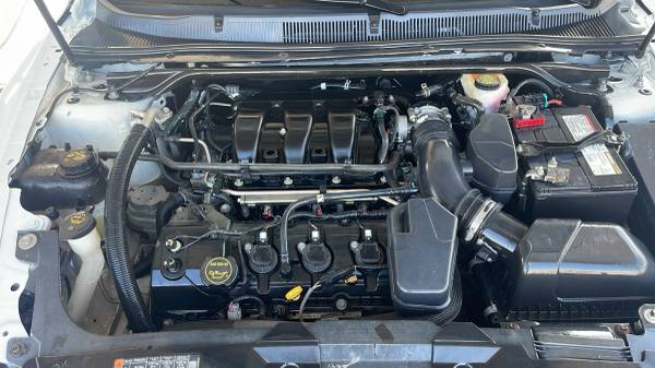 Ford Taurus - $9,800 (Greenacres)63613058554371120