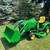 John Deere 1023e compact tractor with a loader and 60 inch deck 1 thumbnail
